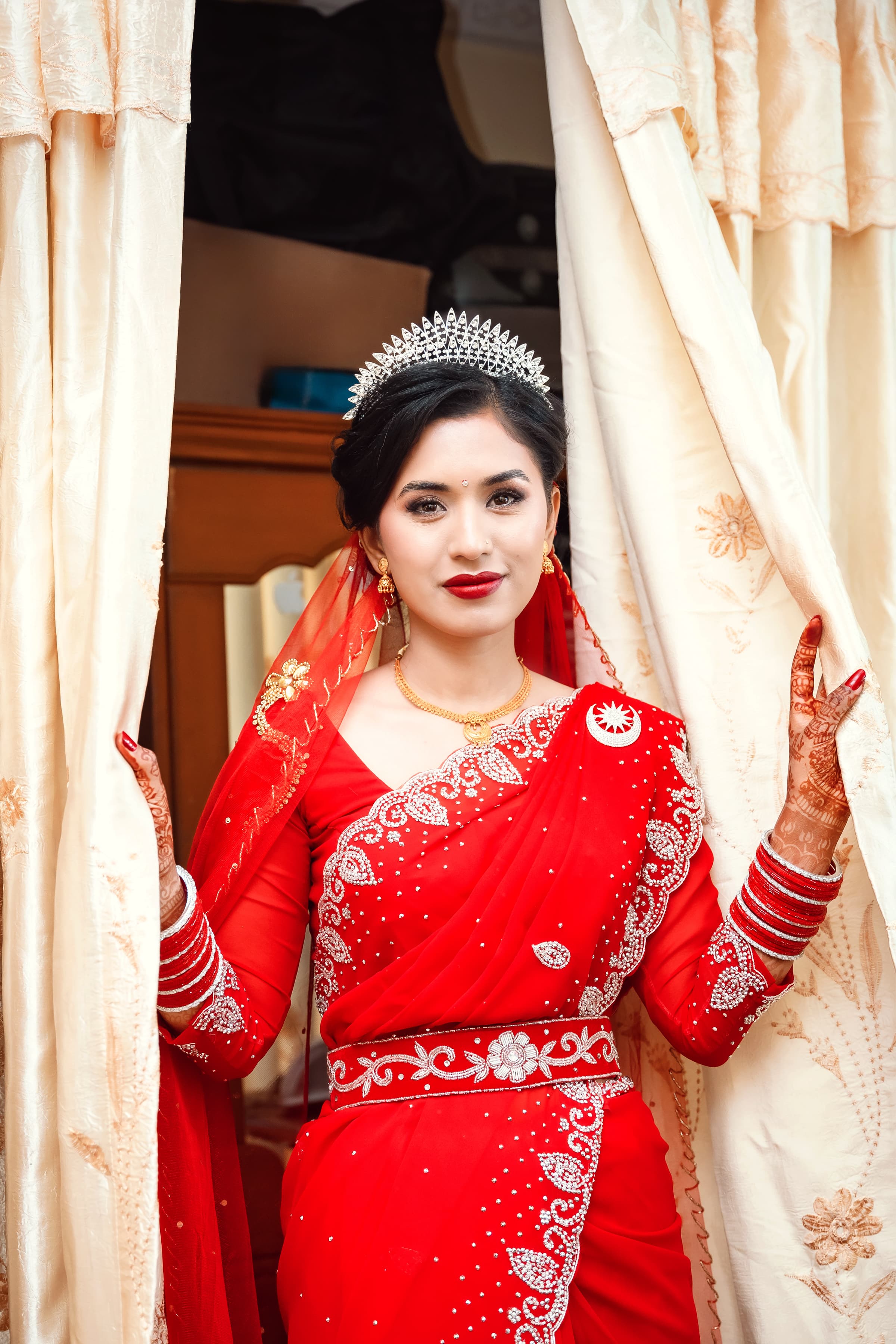 Bride Portrait in Red Saree and Tiara