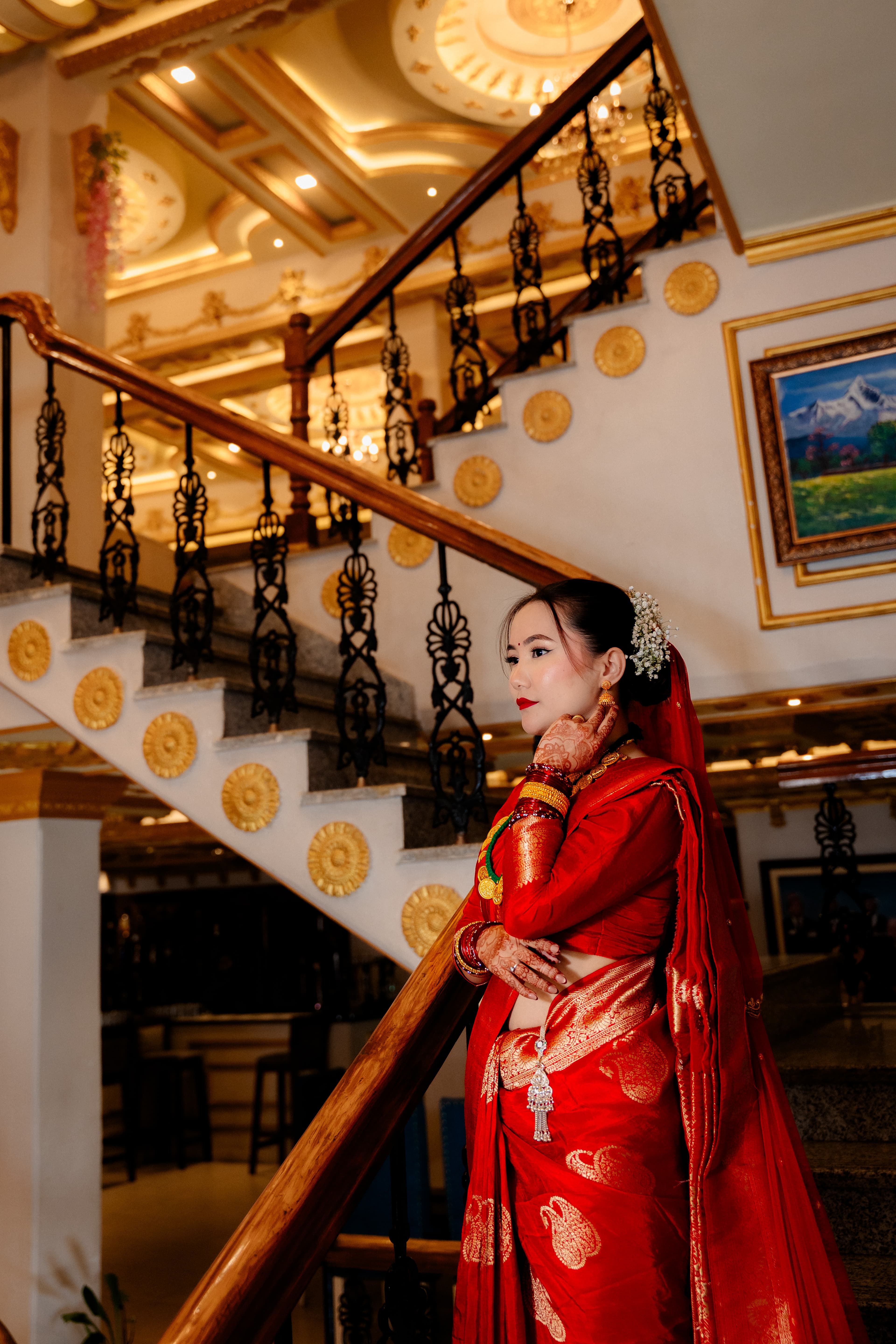 Bride in Red Saree by Staircase