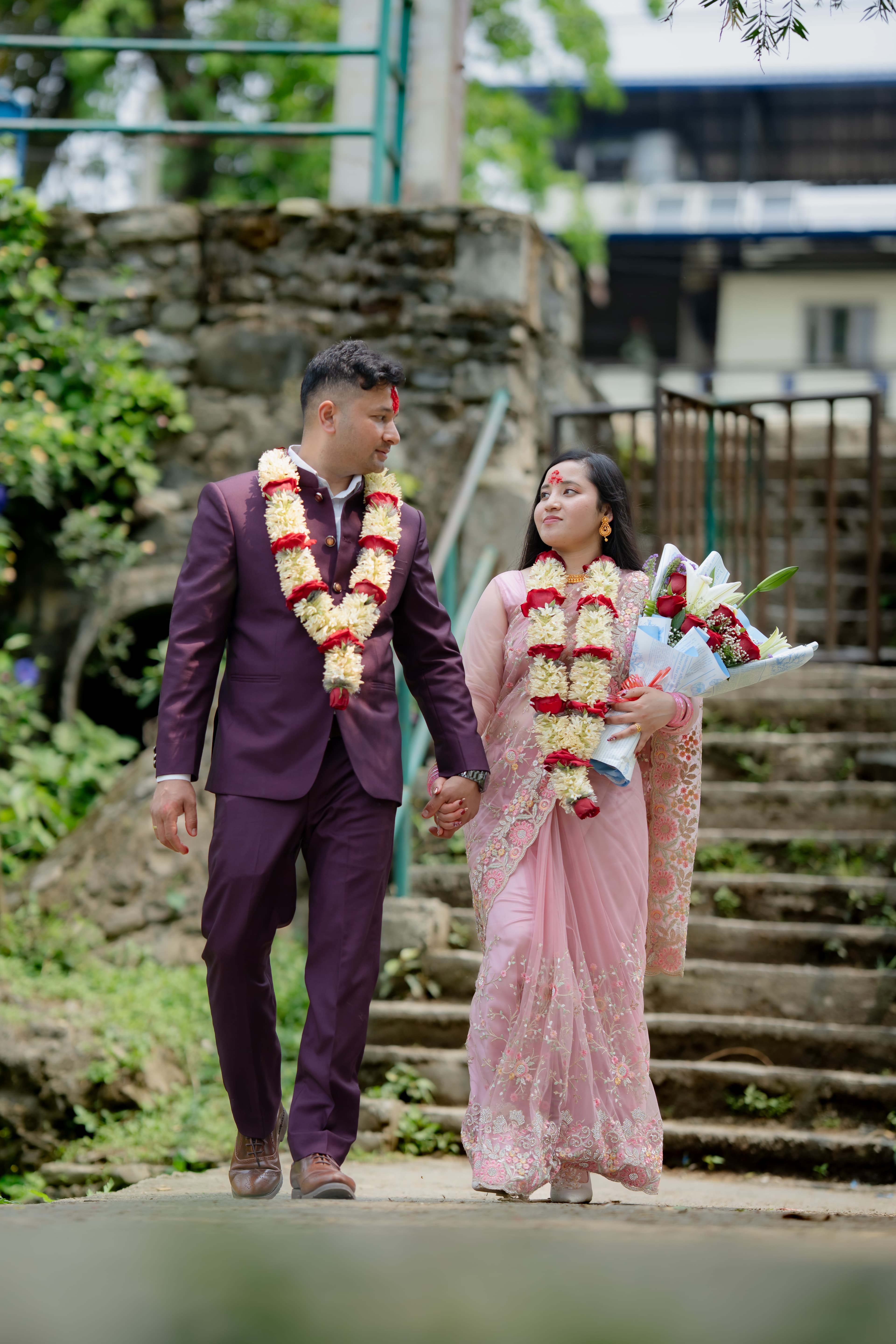 Engagement Couple Walking with Garlands