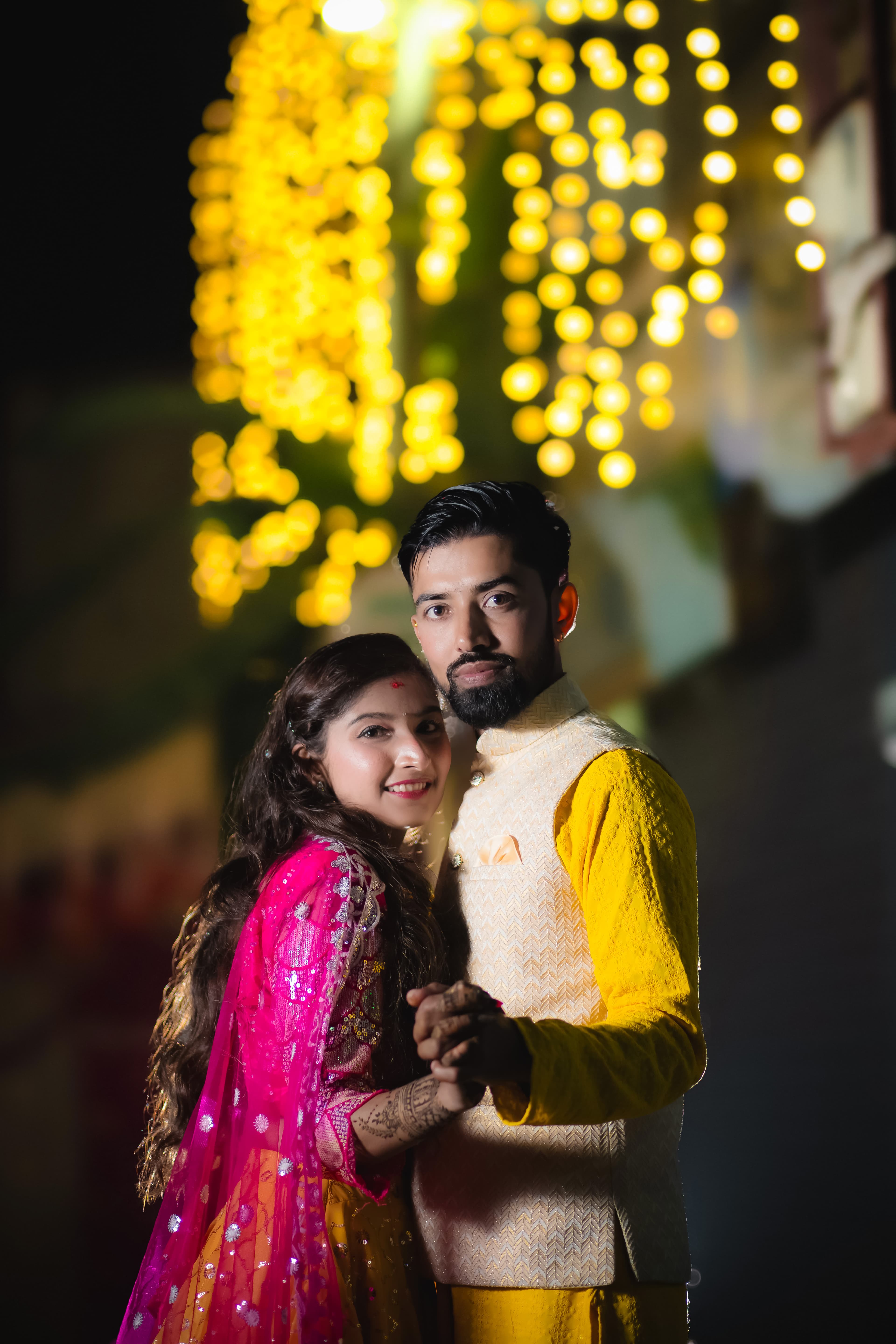 Mehendi Couple Pose with Fairy Lights