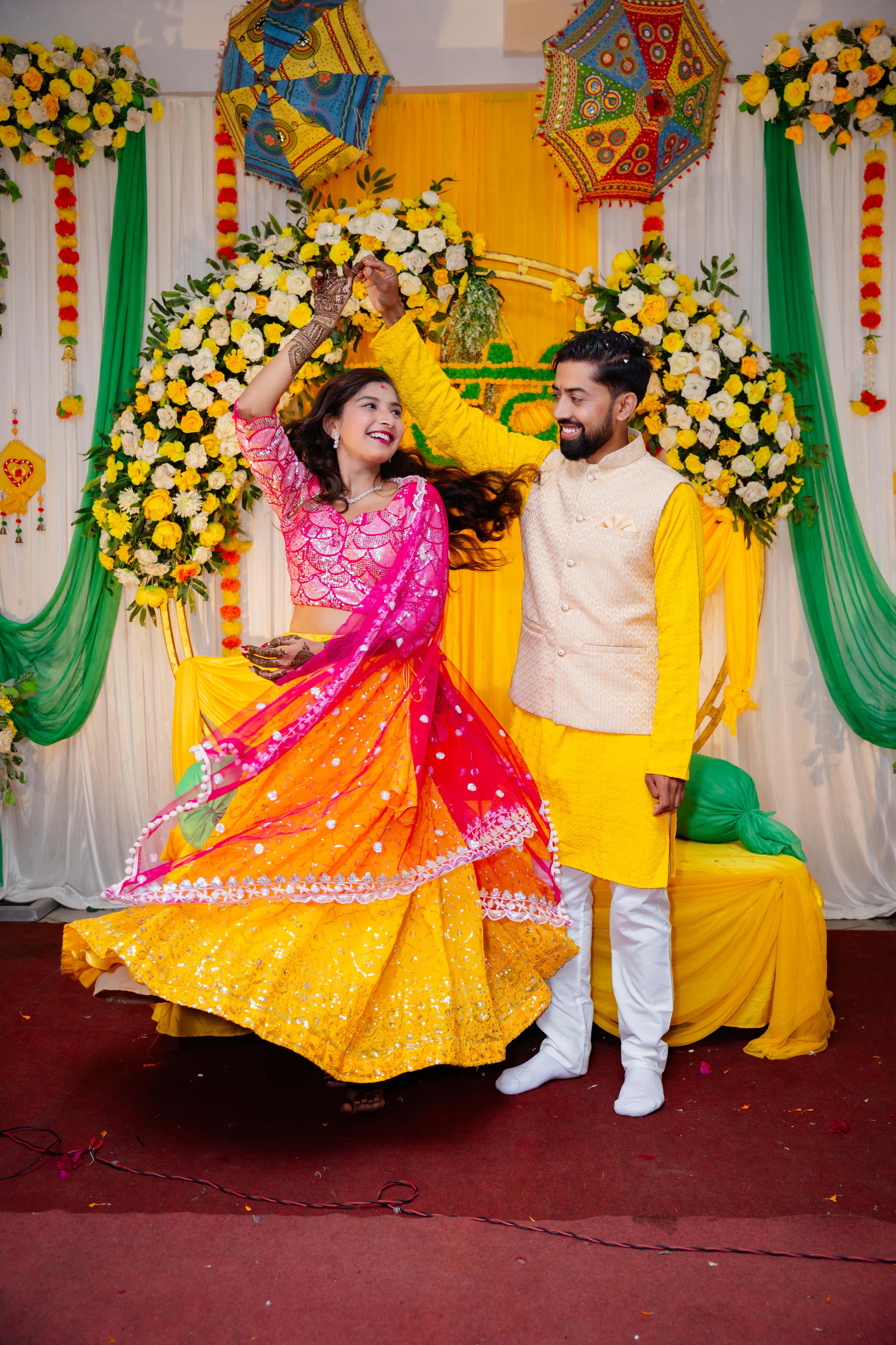 Mehendi Couple Spin on Yellow Stage