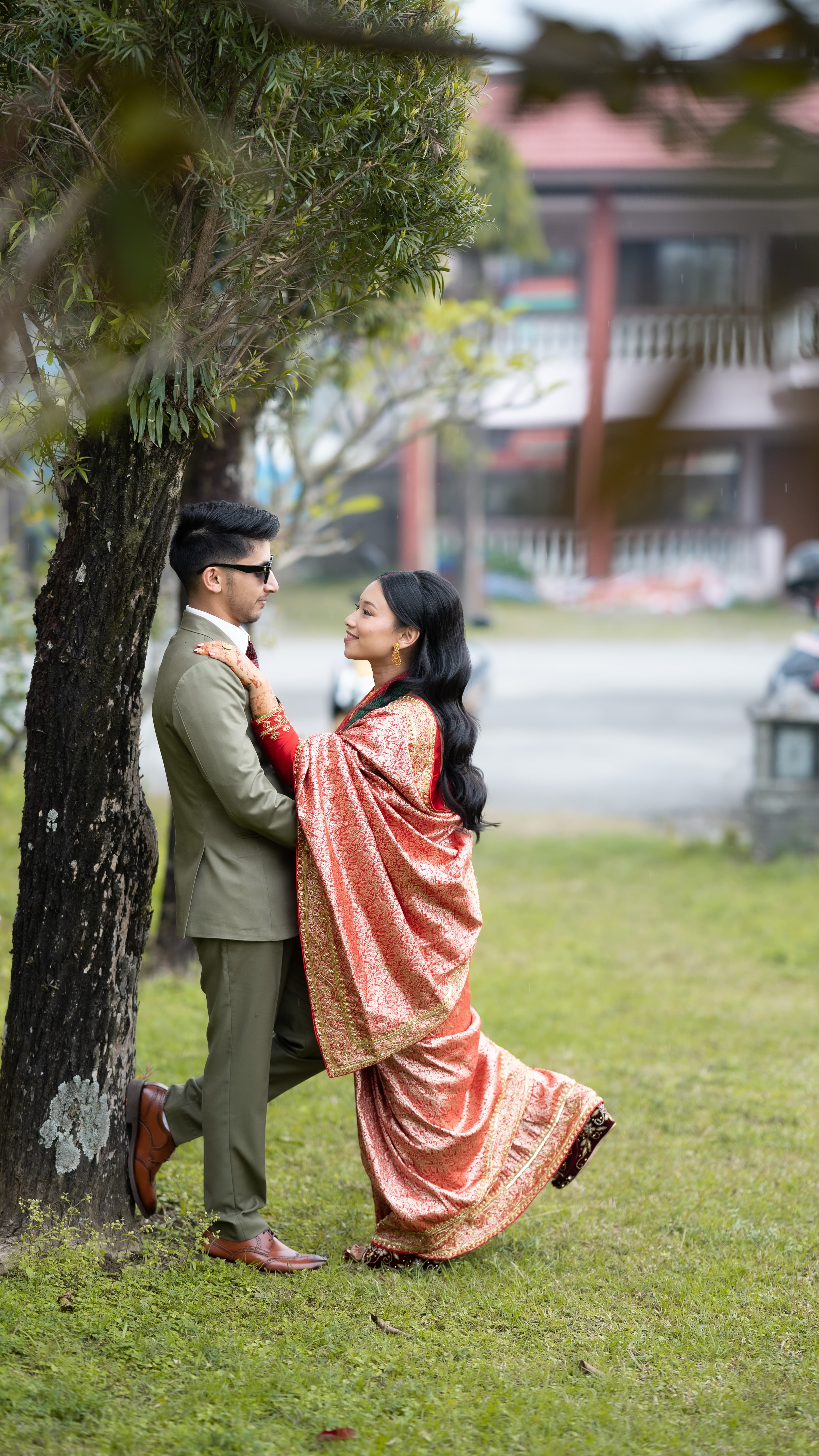 Post-Wedding Couple under Tree
