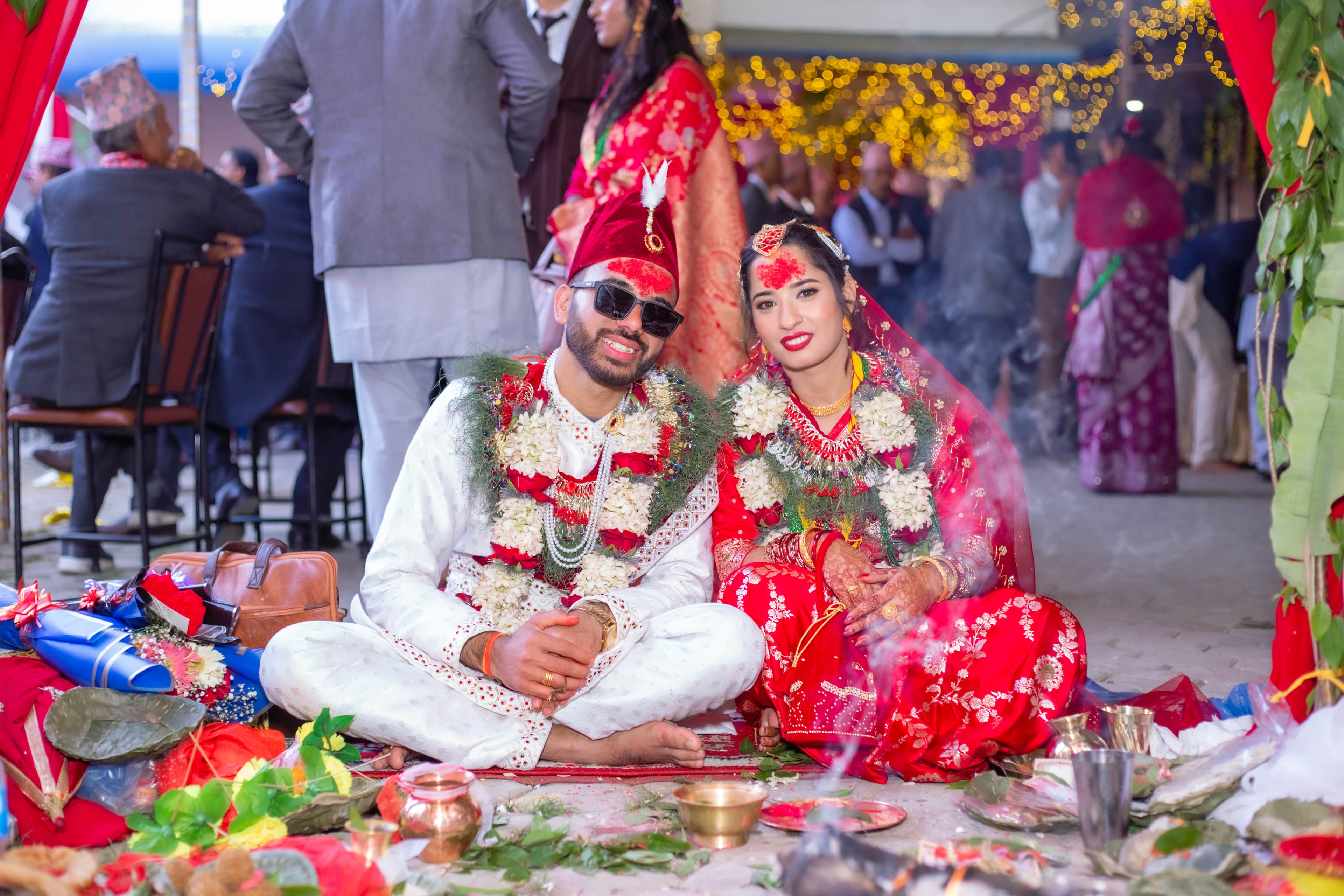 Wedding ceremony couple seated at traditional Nepali rituals, Pokhara